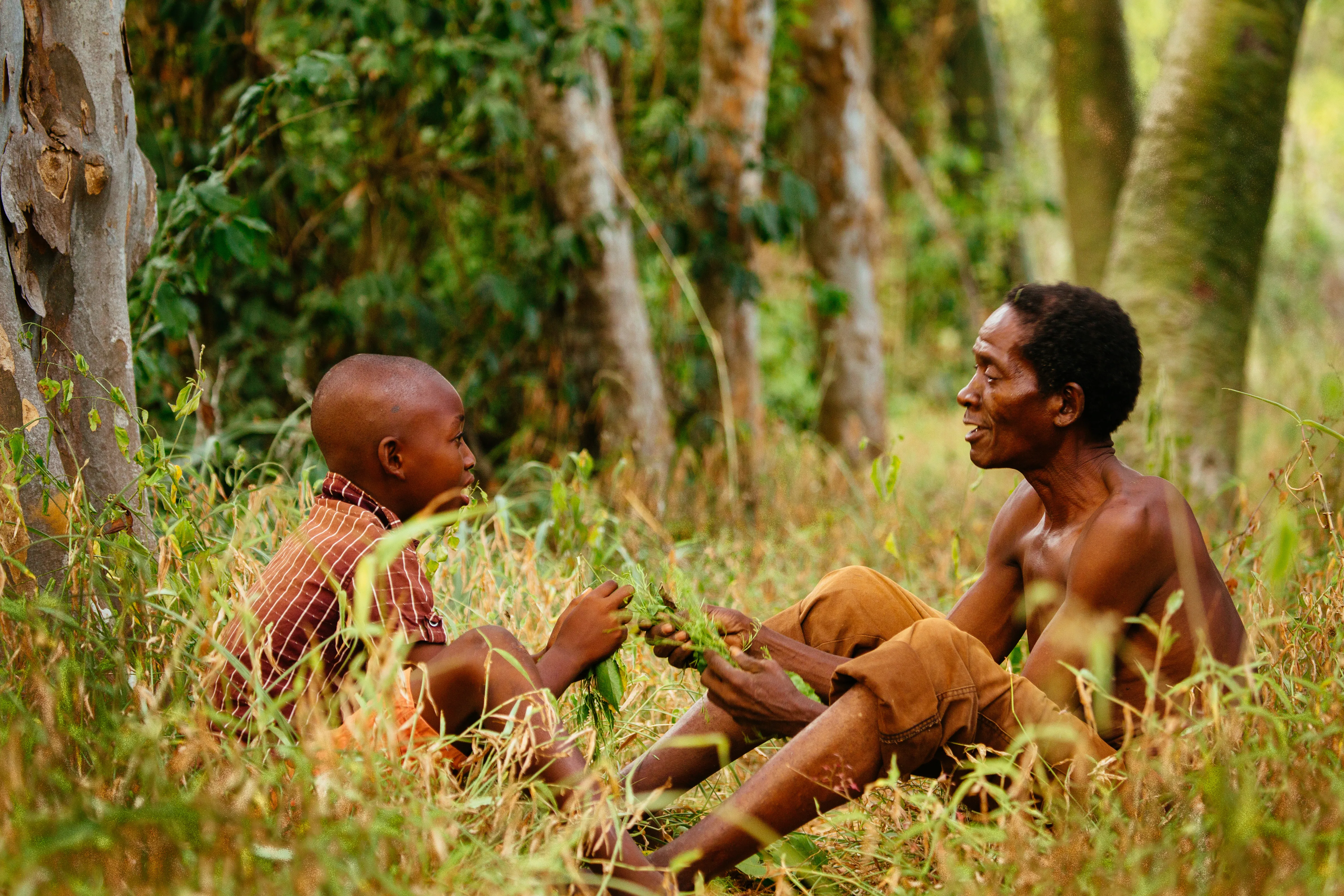 Aerial photo of a large shipping barge next to a concrete pier.